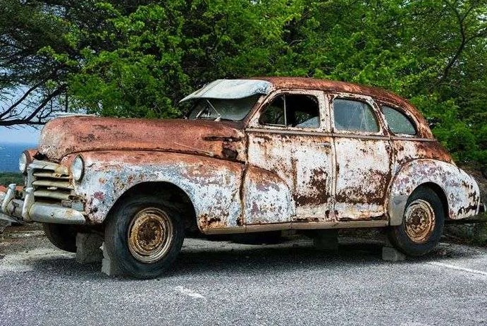 An abandoned old car that can be sold for cash